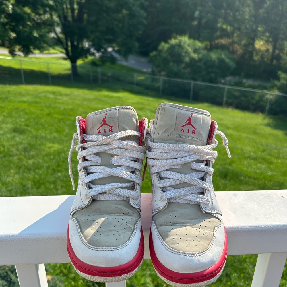 White and pink Jordan 1s